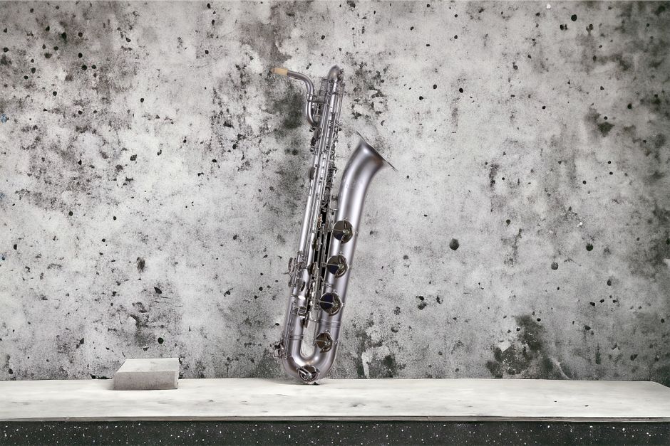 Saxofón s čistiacim prútom